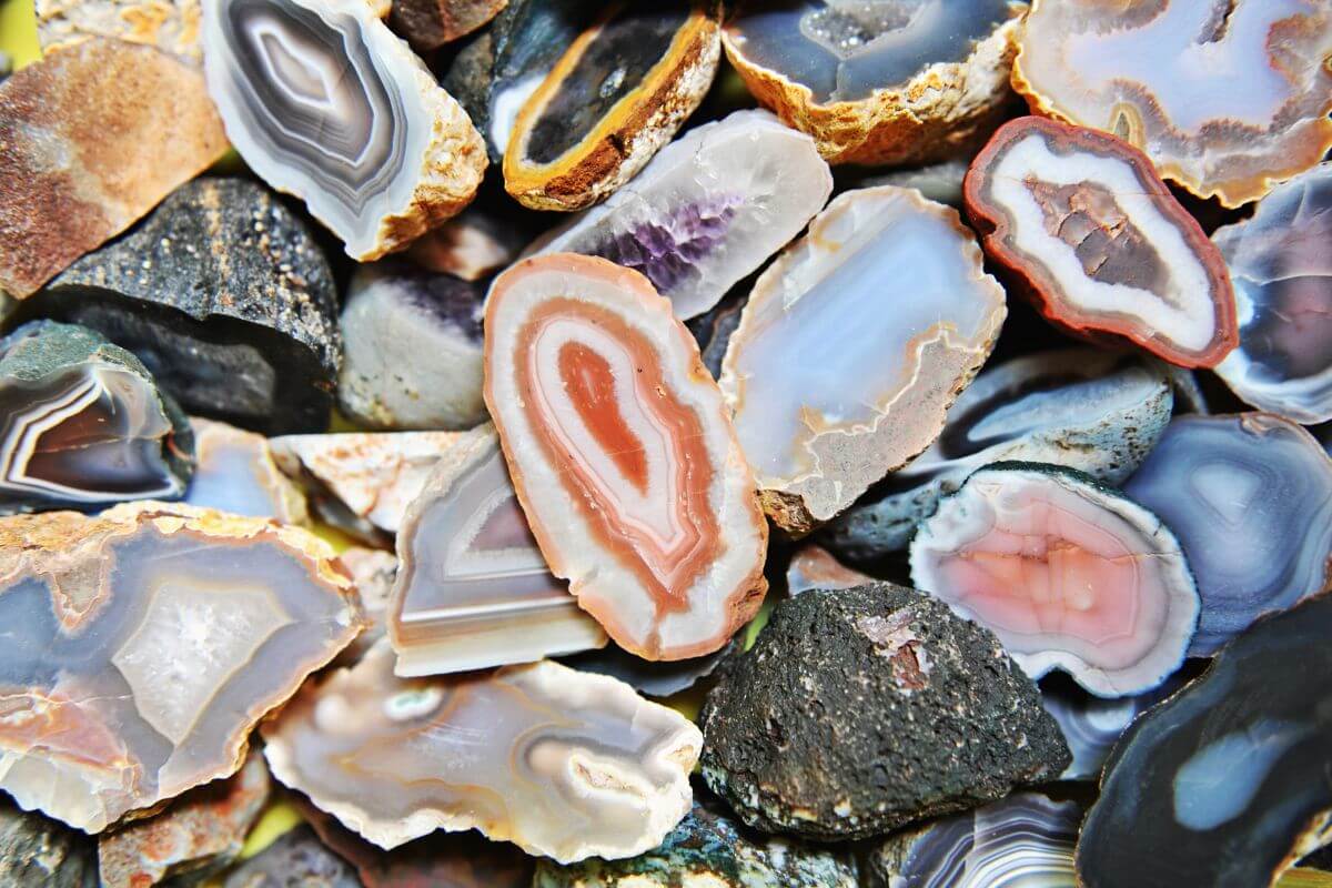 A pile of Montana gemstones, the different colored agates.