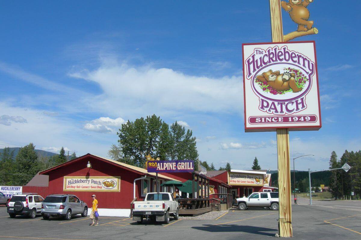 A red building with a Huckleberry signage that features a teddy bear.