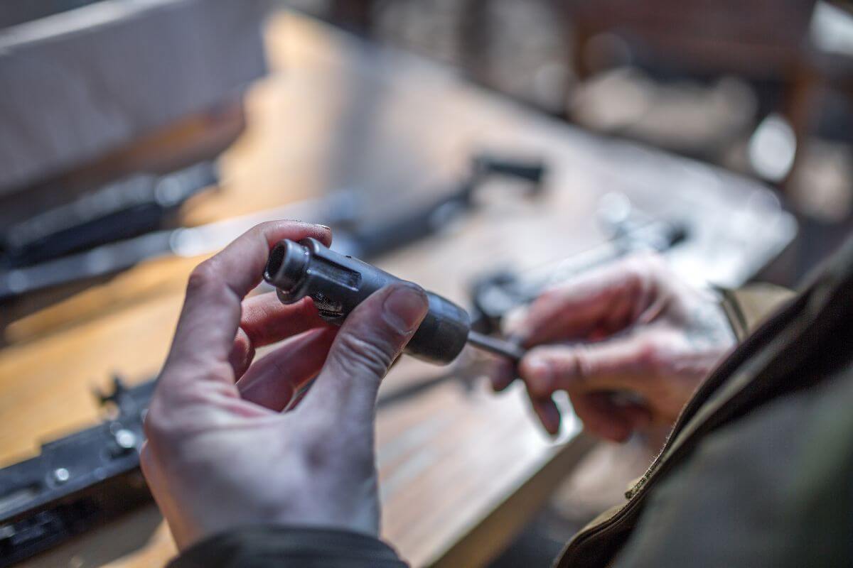 A hunter in Montana cleans his hunting equipment after a hunt