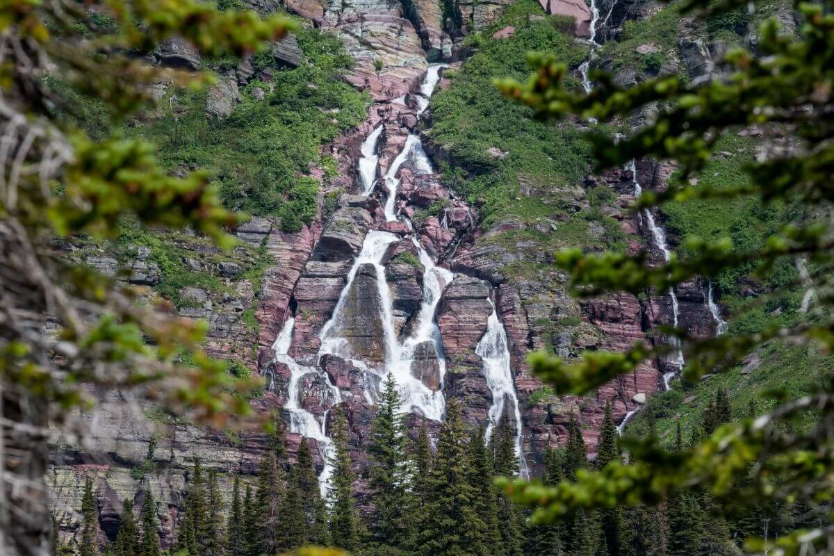 Grinnell Falls cascades down the valley headwall that runs into Grinnell Creek