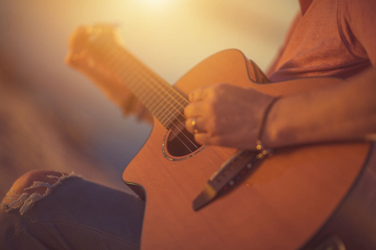 Man Playing a Guitar