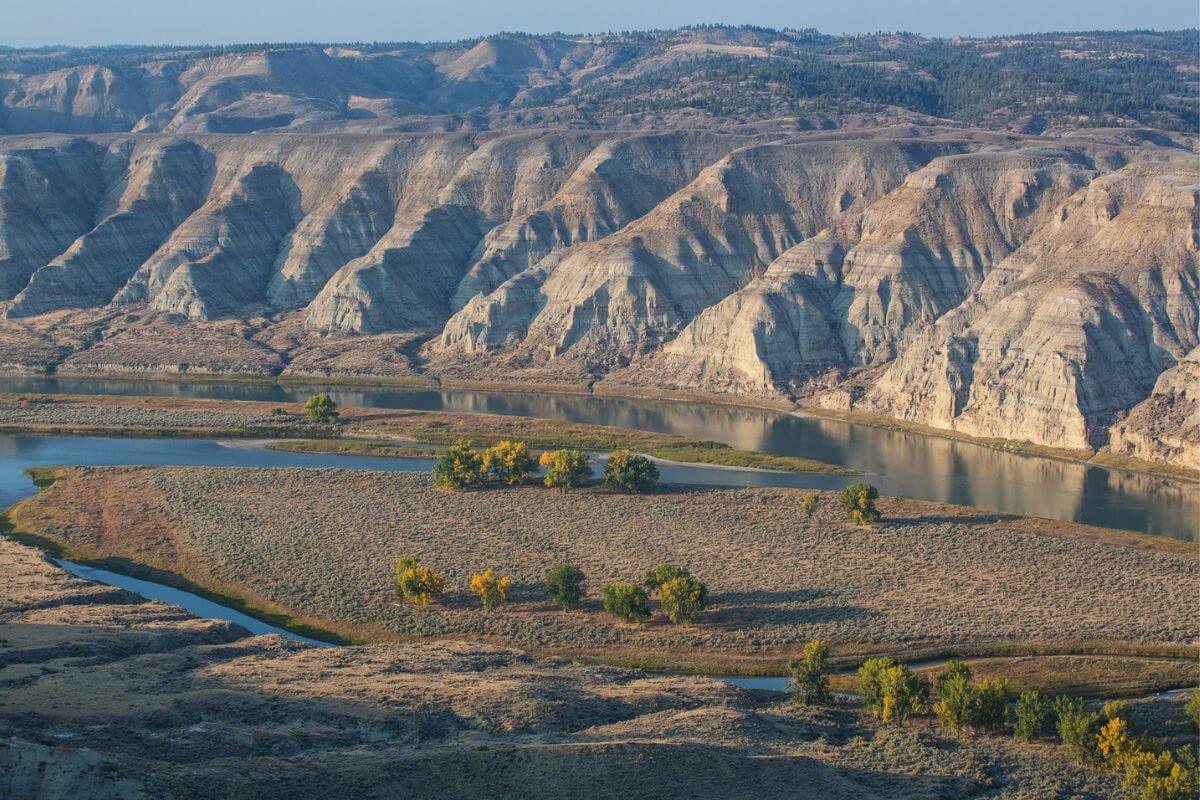 Aerial view of a river running through Upper Missouri Breaks Canyon 