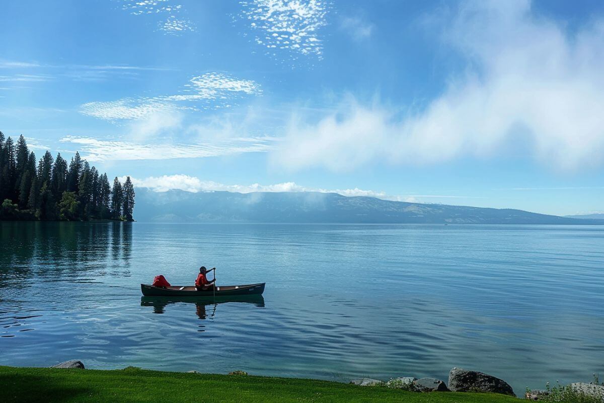 Two people in a canoe on Flathead Lake.