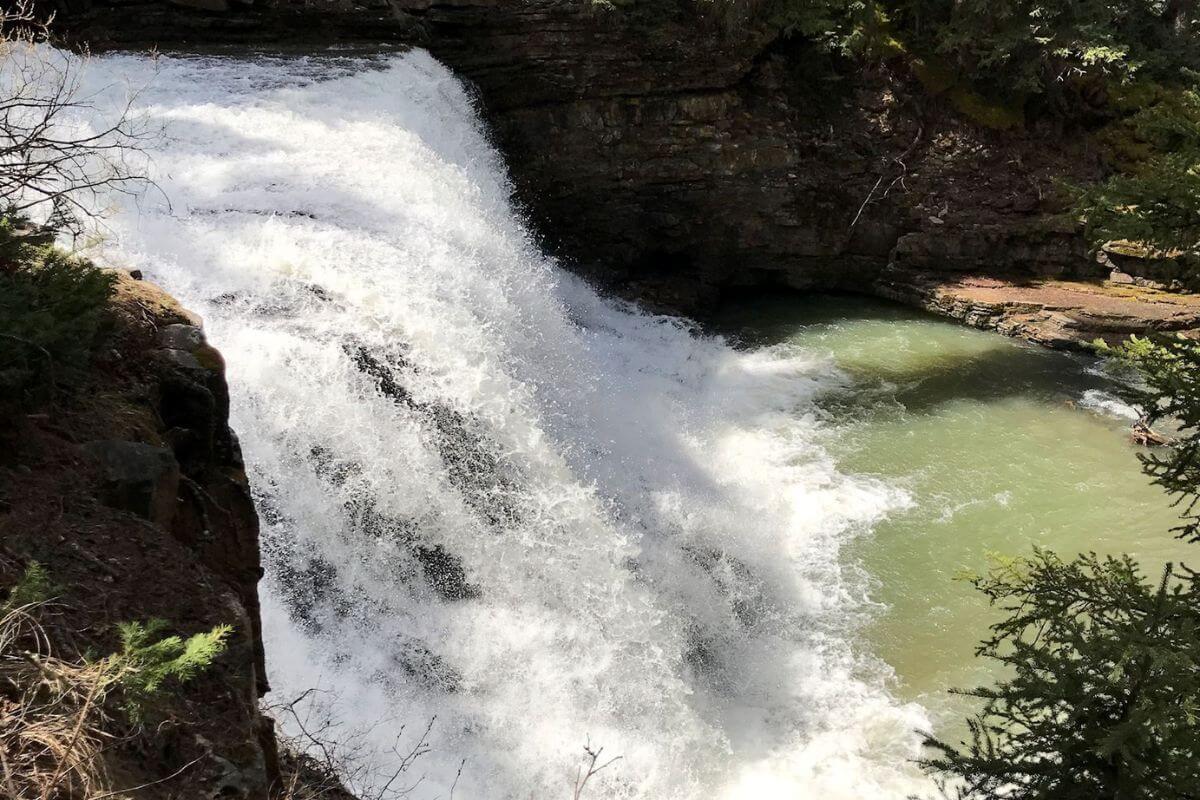 Ousel Falls amid the picturesque landscape of Ousel Falls Park near Big Sky, Montana