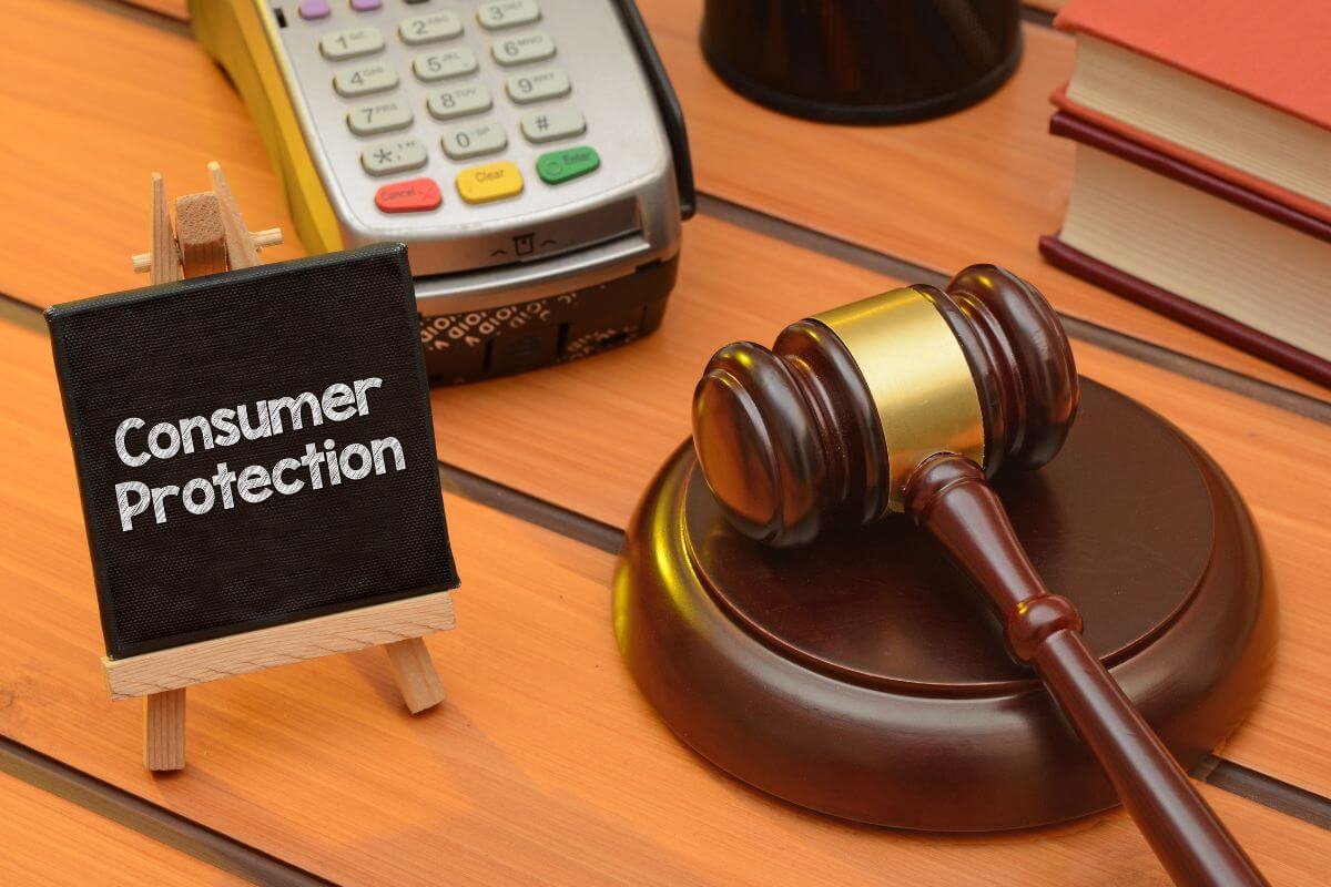 Small Consumer Protection  Letter Board with Gavel and a Credit Card Machine